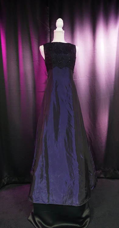 Long blue wedding dress with black accent available for rent at Sci-Fi Wedding Chapel.